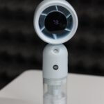 DP 7645 Turbo Mist Spray Handheld Fan showing its misting nozzle and ergonomic handle.