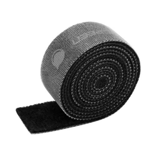 UGREEN Cable Organizer 2m LP124-40354 showing a roll of flexible black hook and loop Velcro wire management tape being used to tie computer and charger cables neatly on an office desk view