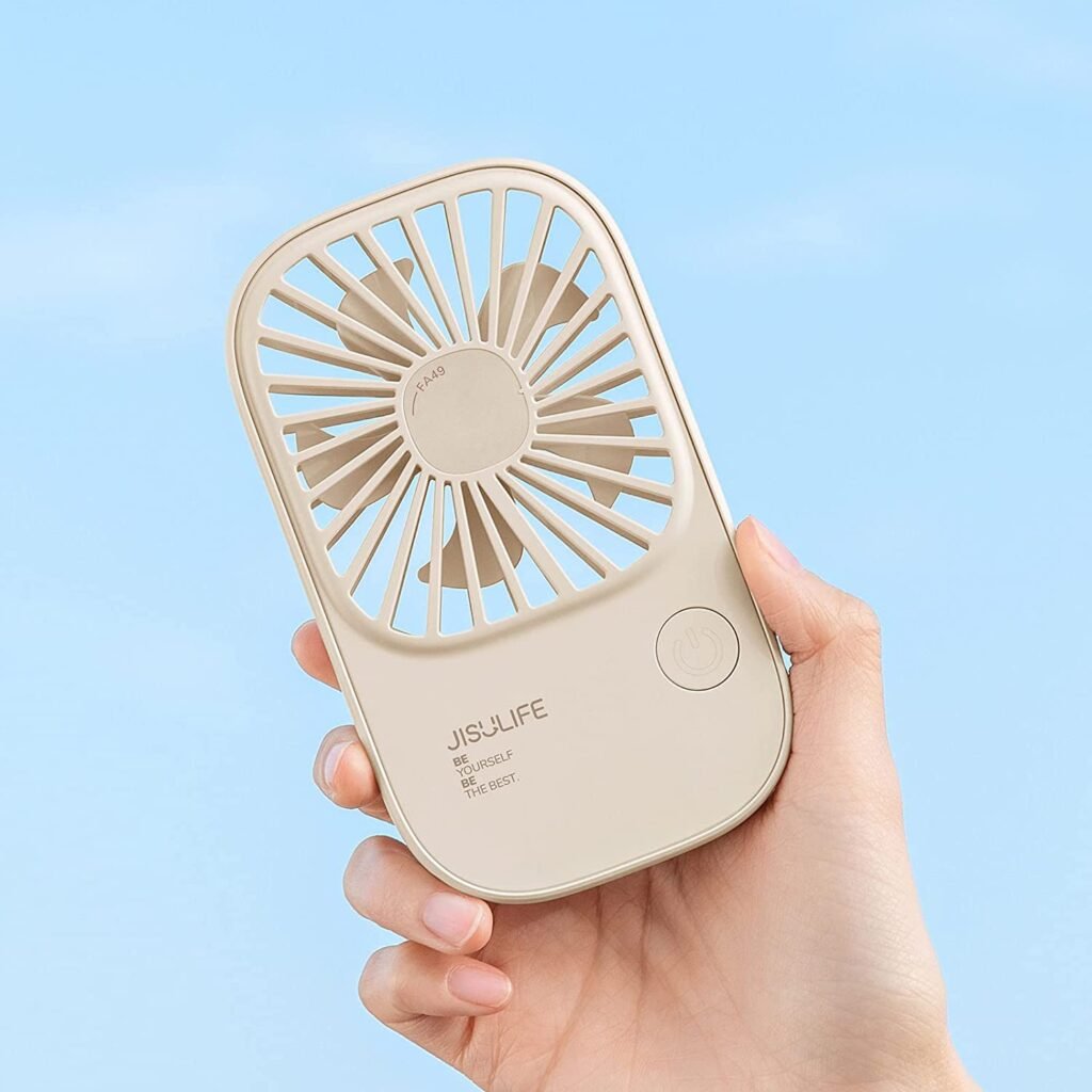 JISULIFE FA49 portable rechargeable handheld fan showing compact lightweight body handle multi speed control button quiet turbine cooling head 2000mah battery USB charging port front view lifestyle setup color choices