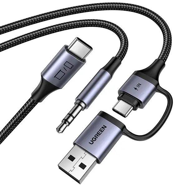 UGREEN 45009 CM772 2-in-1 audio adapter cable layout showing its USB Type-C male source connector split down into a 3.5mm male audio aux plug and dual USB-C plus USB-A charging interface inputs enclosed in space-gray aluminum shells with black braided jackets