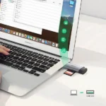 UGREEN 50706 USB-C male short cable to dual slot micro SD and SD memory card reader adapter showing a micro USB power supply input port on a white background