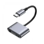 UGREEN 60164 USB-C to 3.5mm audio adapter with 60W PD charging port featuring a compact gray aluminum design on a white background