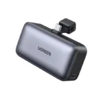 UGREEN 35338 5000mAh Power Bank with Built-in USB-C Connector showing an ultra-compact capsule-shaped black portable mini backup battery with a top type-c connector plug and extended metal kickstand view```