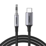 UGREEN 20192 audio adapter cable showing its reversible USB Type-C male plug housing an internal DAC chip and a gold-plated 3.5mm male auxiliary jack connector on a sleek 1-meter black cord