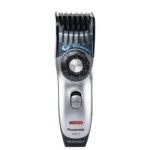 Panasonic ER217 rechargeable corded and cordless electric hair and beard trimmer with built-in quick adjust dial, integrated guide comb, power adapter, and trimmer oil turn on