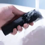 Xiaomi Mi Beard Trimmer professional rechargeable cordless hair and beard trimmer with length adjustment wheel, attachment comb, and USB charging cable