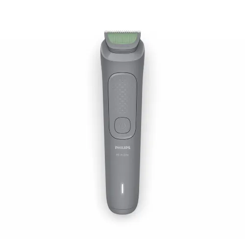 Philips MG3911/15 3000 Series 7-in-1 multi-grooming cordless trimmer handle displayed with nose trimmer head, stubble and beard combs, intimate area guard comb, and USB-A charging wire turn on
