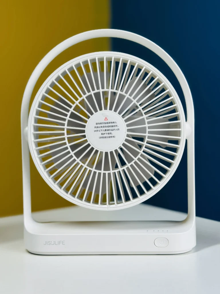 Jisulife FA19A premium compact battery free portable usb desktop fan with 4 speed adjustable dc motor and type-a power cable input fire retardant sleek pocket friendly matte shell layout with 270 degree rotation frame front view