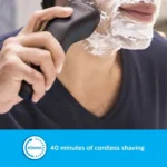 Philips S1121/40 1000 Series rechargeable cordless electric rotary shaver with ComfortCut blades, 3D flex heads, ergonomic grip, and charging cable turn on