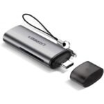 UGREEN 50704 USB-C male to dual slot micro SD and SD card reader hub adapter showing a compact portable design on a white background
