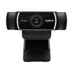 Logitech C922 Pro HD Stream webcam highlighting its sleek black rectangular casing premium glass central lens element and side mesh texture stereo microphone wings mounted on a monitor clip stand lines