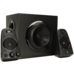 Logitech Z623 2.1 multimedia speaker system showing its premium THX certified twin satellite speakers with right ear master volume and bass adjustment dials next to a large heavy duty central wooden subwoofer unit lines