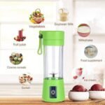 Portable Rechargeable Battery Juice Blender units lined up in multiple pastel colors showing clear mixing jars filled with sliced fruits integrated power buttons and travel carrying loops