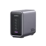 UGREEN 90903B Nexode 300W 5-Port PD GaN Fast Charger EU flagship desktop power hub showing its four USB-C interfaces, single USB-A port, premium space gray finish, and detachable AC power cord layout on a clean white background