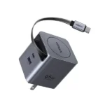 UGREEN 65824 65W GaN Fast Charger with Retractable Cable showing its compact circular design layout, smoothly extending built-in Type-C cable, additional charging ports, and premium travel-ready matte finish on a clean white background