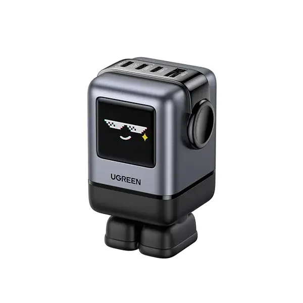 UGREEN 45514B Uno 100W 4-Port GaN Fast Charger US showing its futuristic space grey robot figurine body, animated pixel emoji LED face screen, and top multi-port array on a clean white background