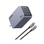 UGREEN 25873 Nexode Pro 100W 3-Port GaN Fast Charger Set US showing its compact dark grey charger housing, two USB-C ports, one USB-A port, foldable US prongs, and the included premium black high-wattage Type-C charging cable on a clean white background