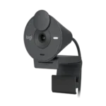 Logitech Brio 300 Full HD webcam highlighting its unique graphite gray speckled asymmetric cone casing central wide glass lens element and flip down privacy shutter disk on monitor stand lines
