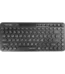 A4TECH FBK36C AS wireless keyboard in sleek matte black showing its ultra-compact tenkeyless layout, unique retro circular keycaps with clear laser-inscribed characters, and upper multi-device connection indicators