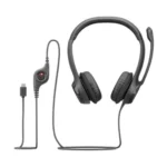 Logitech H390 USB-type C computer headset in a smooth dark finish showing its plush padded leatherette headband design, cushioned ear cups, adjustable microphone boom arm, and integrated inline control module leading down to a reversible Type C connector port plug