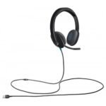 Logitech H540 USB computer headset in a glossy black premium finish showing its plush padded leatherette headband design, cushioned ear cups with integrated on ear control buttons, a hide away rotating microphone boom arm, and a dedicated in line LED mute indicator light lines