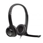Logitech H390 USB computer headset in a smooth dark grey finish showing its plush padded leatherette headband design, cushioned ear cups, adjustable microphone boom arm, and integrated inline control module lines