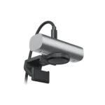 Logitech MX Brio 4K Ultra HD webcam highlighting its solid metallic gray aluminum chassis casing central circular lens ring hardware and versatile screen mounting clip stand lines