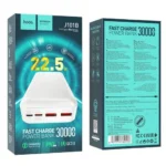 Hoco J101B Astute 22.5W 30000mAh Fast Charging Power Banks displayed in white and black retail packaging highlighting their top port layouts with dual red USB-A slots, a Type-C port, and subtle 4-dot LED power level meters