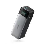 Anker 737 Power Bank PowerCore 24K A1289 showing its smart digital color display with active input and output wattage statistics alongside charging ports