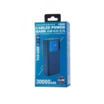 Remax RPP-571 30000mAh fast charging power bank showing its large digital display screen on the front face and integrated dual cables stored cleanly on the back