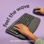 Logitech Wave Keys premium wireless ergonomic keyboard with curved wave shape keyframe profile integrated three layer memory foam cushioned palm rest multi device bluetooth connectivity logi bolt security receiver and long battery life graphite finish desk setup